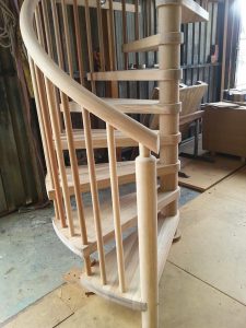 spiral light phil mahogany round rail posts and balusters