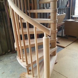spiral light phil mahogany round rail posts and balusters